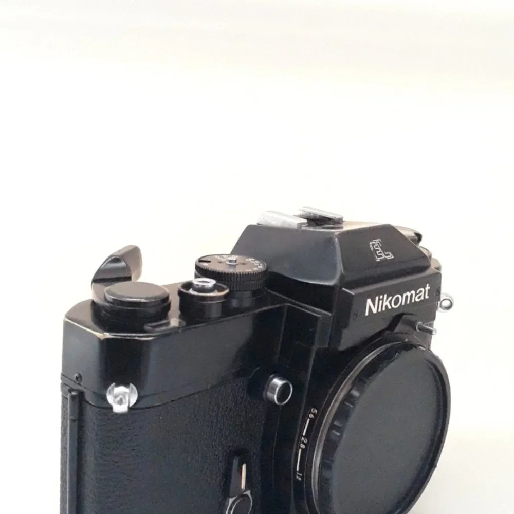 Nikon Nikkomat EL Nikkor 35-80mm 4-5.6D Zoom lens. Leather case